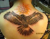 What does a falcon bird tattoo mean?
